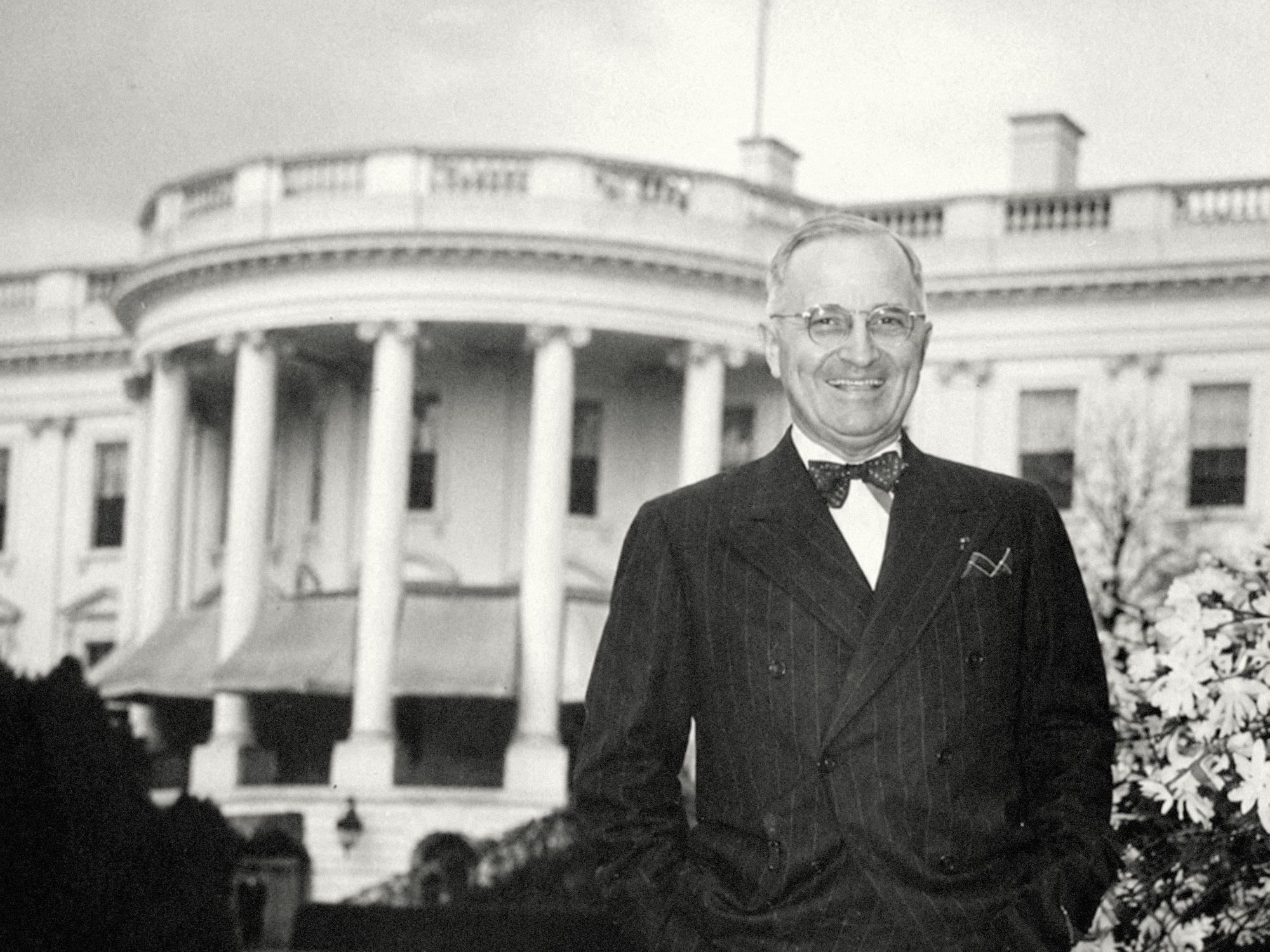 President Harry Truman in front of the White House